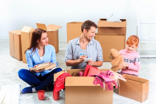 Packing furniture and boxes into a moving truck in Bloomsbury for safe transport