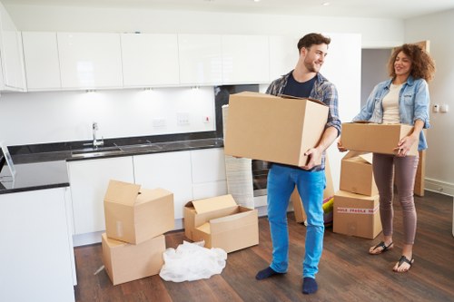Office relocation preparation with labelled boxes and protective packing